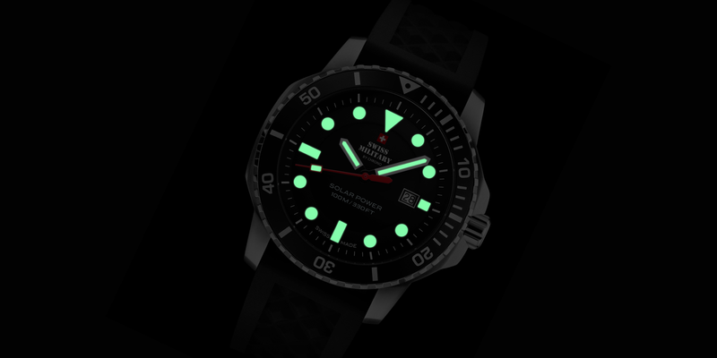 Luminous green hands and hour markers on the black dial of the Swiss Military SMS34102 Solar Watch.